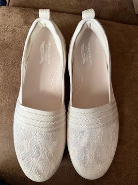 Skechers Women's Cream Slip-On Knit Flats